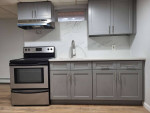 Renovated kitchen with modern appliances in a two-bedroom apartment in East Orange.