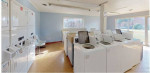 Laundry facilities in the El Dorado apartment community featuring modern washing machines and spacious layout.