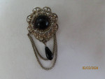 Black brooch and earrings