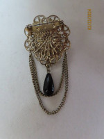 Black brooch and earrings