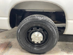 Close-up of a Goodyear tire on a 2007 Dodge Ram 2500HD, showcasing its durable tread and rim.