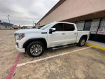 2020 GMC Sierra 1500 Denali 4WD in pristine condition, parked outside with clean body and shiny wheels, 63,000 miles.