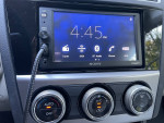 Interior view of 2015 Subaru XV Crosstrek hybrid showing Sony radio and climate control features.