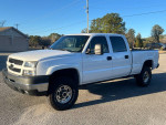 2003 Chevrolet Silverado 1500 truck in great condition with 111,000 miles parked outdoors