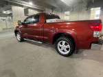 2008 Toyota Tundra 4WD in a parking garage, showcasing its exterior and design features.