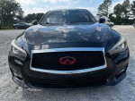 Front view of a black Infiniti Q50 Premium sedan parked outdoors, showcasing its sleek design