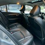 Interior view of a fully loaded INFINITI Q50 with leather seats and sunroof