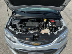 2019 Chevrolet Sonic LT engine view showing 1.4L I4 engine in Silver Ice Metallic hatchback