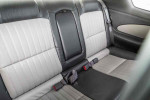 Interior view of the back seat in a 2001 Chevrolet Monte Carlo LS with gray and black upholstery.