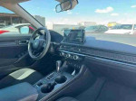 Interior view of a 2022 Honda Civic LX with Apple CarPlay and backup camera features
