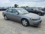 2006 Chevrolet Impala LS in gray color, running smoothly with 170,000 miles for sale at $2,900