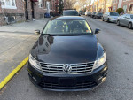 Front view of a black 2013 Volkswagen CC R-Line FWD, showcasing its sleek design and fully loaded features.