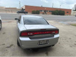 2014 Dodge Charger R/T in silver, well-maintained, for sale by owner with clean title and great gas mileage.
