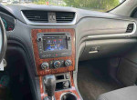 Interior view of a 2014 Chevrolet Camaro LS with navigation system and climate controls.