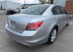 Rear view of a silver 2012 Honda Accord EX-L V-6 with 150,000 miles for sale.