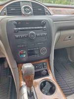 Interior view of a 2012 Buick Enclave showing dashboard and control buttons
