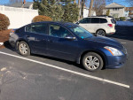 2010 Nissan Altima 2.5 SL Sedan parked, showcasing clean exterior and well-maintained condition.