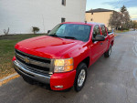 2011 Chevrolet Silverado 1500 LT 4WD in red, showcasing a clean exterior and good condition