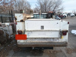 Rear view of a 1996 Ford F350 service truck with low mileage and strong V8 engine for sale in Commerce City, CO.