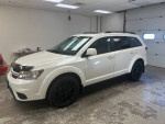 2014 Dodge Journey R/T FWD in pearl white, showcasing sleek design and upgraded black wheels.
