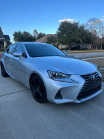 2017 Lexus IS200t, silver sedan in excellent condition, with 84k miles and advanced features.
