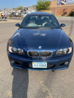 2004 BMW M3 in Mystic Blue, 142k miles, needing cosmetic TLC, with clean title and carfax.