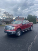 2013 Ford F-150 Lariat in red, 4WD, clean with 54k miles, ready for sale in great condition.