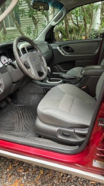 Interior view of a 2007 Ford Escape XLT SUV with gray seats and dashboard.