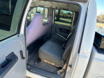 Interior view of a well-maintained 2006 Ford F-250 cabin with clean seats and ample space.