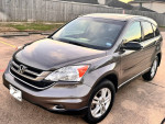 2011 Honda CRV-EX in excellent condition with 147,000 miles, featuring Bluetooth and keyless entry.