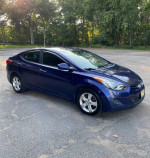 2011 Hyundai Elantra GLS FWD in blue, well maintained, low mileage, parked outdoors.