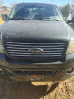 2006 Ford Harley Davidson truck for sale, 99000 miles, needs fuel pump and latch repairs, new tires and battery.