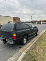 Reliable Chevrolet Suburban parked, preparing for Audi A5 replacement, showcasing excellent mechanical condition.