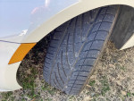 Close-up of a well-maintained tire on a 2006 BMW Z4, showcasing tread and condition.