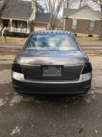 Rear view of a 2008 Honda Accord, showcasing its sleek design and taillights.