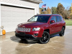 2014 Jeep Compass Latitude in excellent condition, showcasing stylish design and low mileage, parked in a driveway.