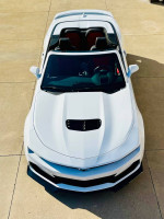Top view of a pristine 2023 Chevrolet Camaro 2SS Convertible in white with a black interior.