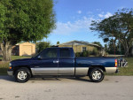 2000 Chevy Silverado LS truck with 5.3L Vortec engine, 175k miles, blue color, parked outdoors.