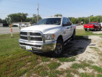 2018 Dodge Ram 2500 Diesel 4X4 truck in great condition parked on grass, ready for work.