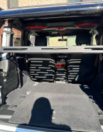 Interior view of a 2020 Jeep Wrangler with upgraded features and spacious cargo area