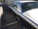 1973 Rolls-Royce Silver Shadow vintage car with two-tone silver and black exterior parked.