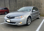 2009 Subaru Impreza Outback Sport AWD parked with clean exterior and 17-inch wheels, showcasing sport design.