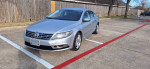 Silver 2013 Volkswagen CC Sport parked, showcasing its sleek design and excellent condition.