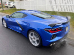 2021 Chevrolet Corvette Z51 in showroom condition, blue exterior, parked on a residential street.