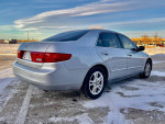2005 Honda Accord LX sedan in silver color with clean exterior, parked on snowy ground