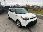 2016 Kia Soul in white with alloy wheels, showcasing exterior features and clean design.