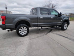 2017 Ford F250 Platinum truck with 98k miles, clean Texas title, in good condition on a concrete surface.
