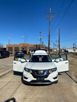 Front view of a 2017 Nissan Rogue S FWD with doors open, parked in West Monroe, LA.