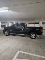 2014 Chevrolet Silverado 2500HD LTZ 4WD in a parking garage with 59k miles and a clean title
