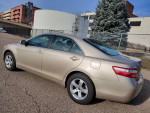 2008 Toyota Camry LE in excellent condition with low mileage, parked in an outdoor setting.